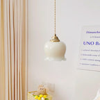 Suspension design BRIXO en laiton – luminaire design salon – Klaross