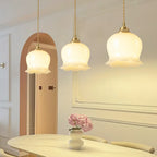 Suspension design BRIXO en laiton – luminaire design salon – Klaross