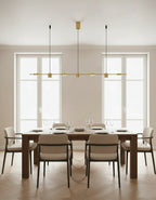 Luminaire suspendu doré LED au design rectangulaire moderne, parfait pour salle à manger ou espace professionnel.