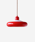 Luminaire en verre design style lustre moderne pour salon.
