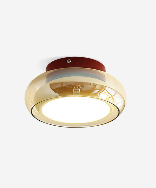 Luminaire en verre fluide pour salon lumineux.