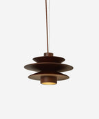 Luminaire suspendu en verre design pour intérieur moderne.