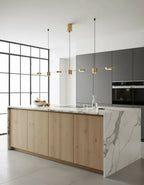 Plafonnier industriel doré en métal avec trois lampes, 75 cm de largeur, idéal pour style moderne et épuré.