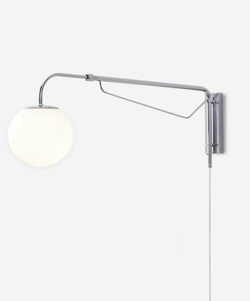 Plafonnier en verre diffusant une lumière design contemporaine.