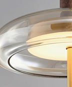 Suspension en verre lumineuse pour salon moderne.