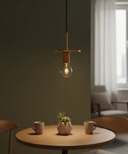 Suspension en verre lumineuse pour éclairage design dans un intérieur moderne.